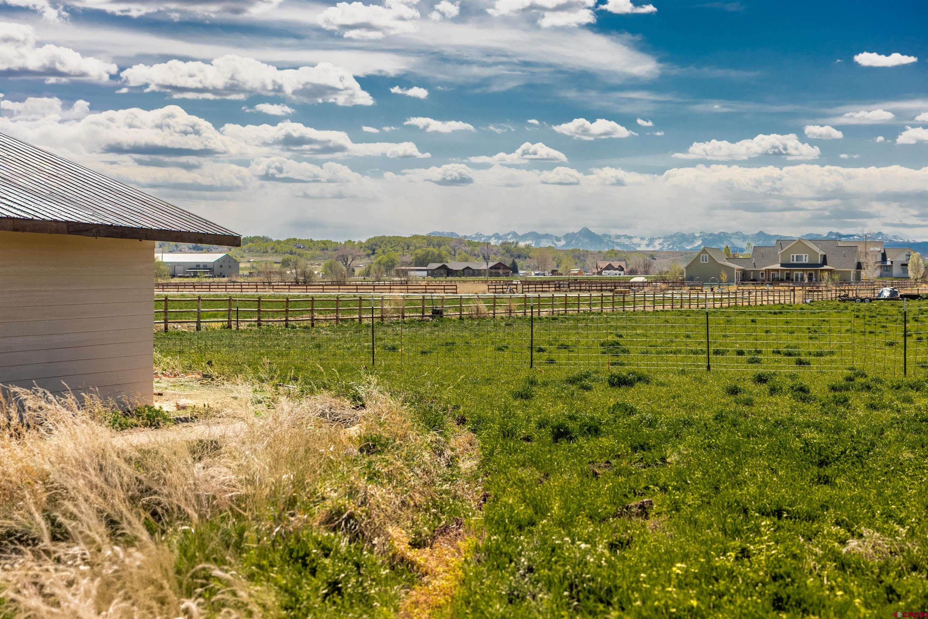 Lot 3 Jefferson Road Montrose, CO 81403 - Photo 12 of 24 a view of a lake with a big yard