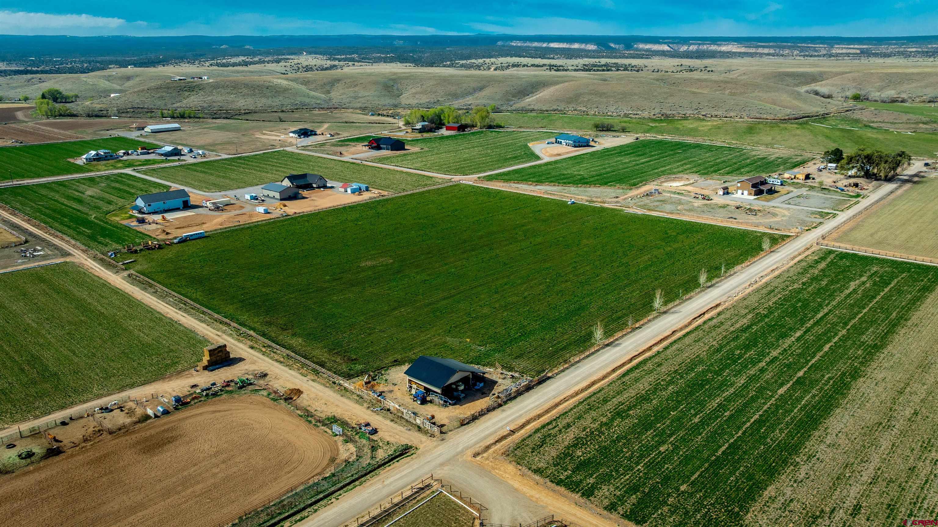 Lot 3 Jefferson Road Montrose, CO 81403 - Photo 16 of 24 a view of a pool with lawn chairs and a big yard