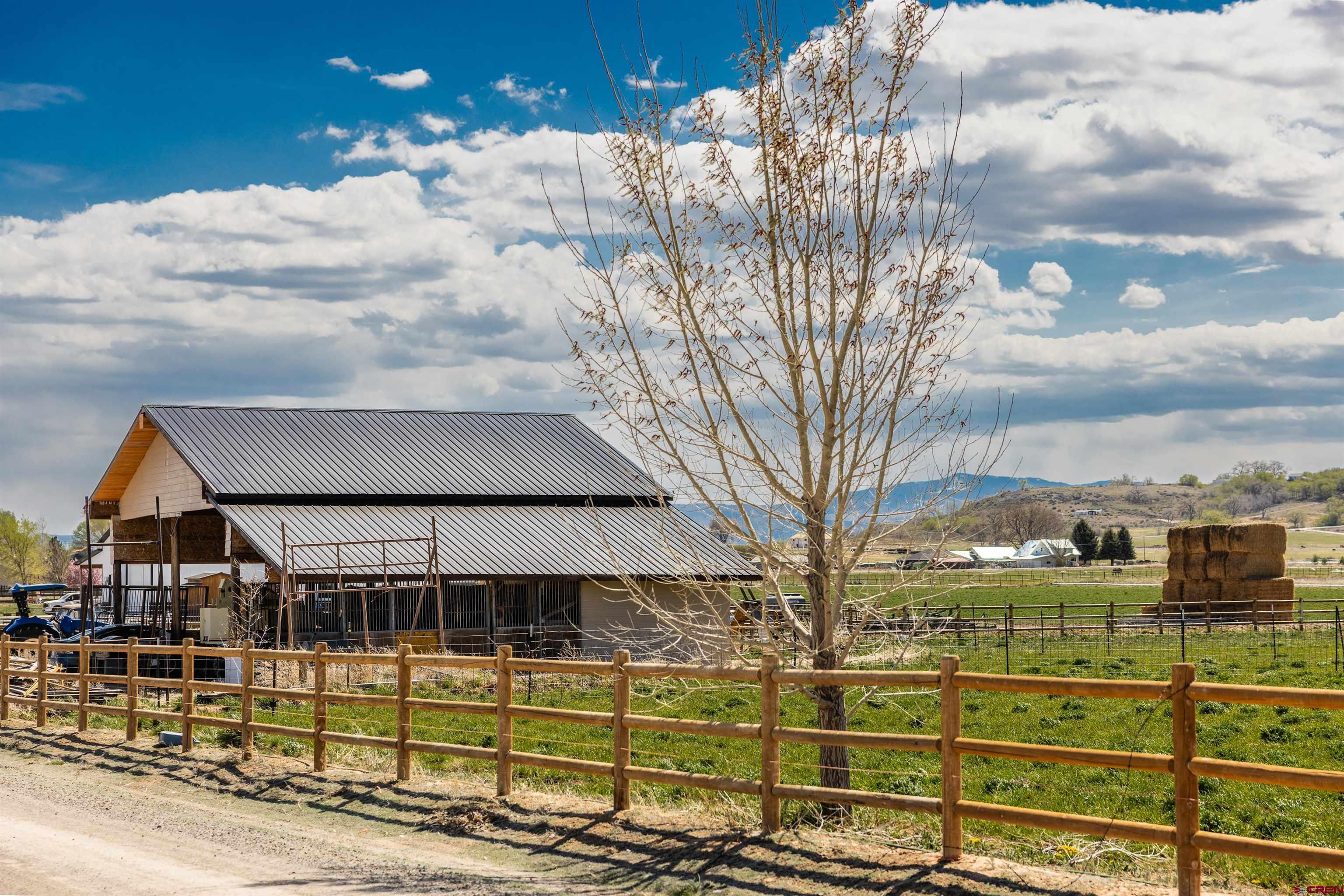 Lot 3 Jefferson Road Montrose, CO 81403 - Photo 4 of 24 a view of a house with a backyard