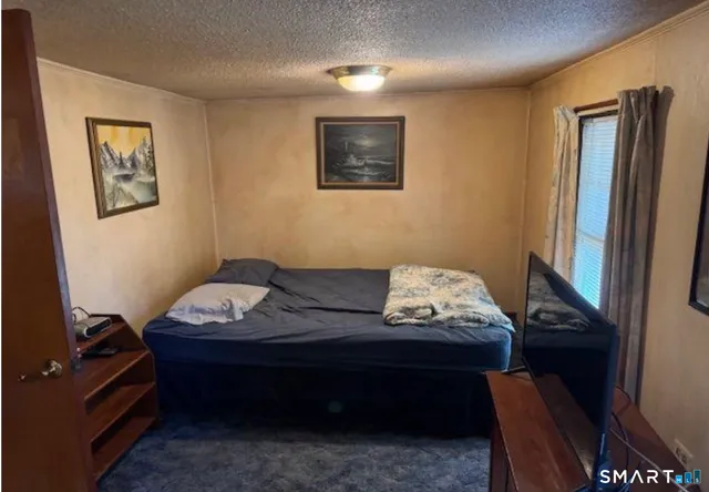 a view of a workspace with furniture