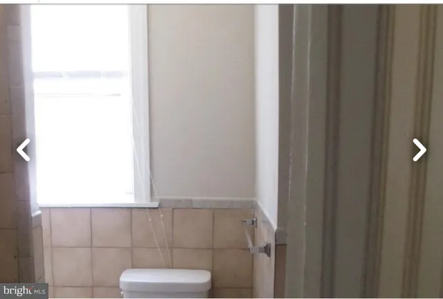 a bathroom with a toilet