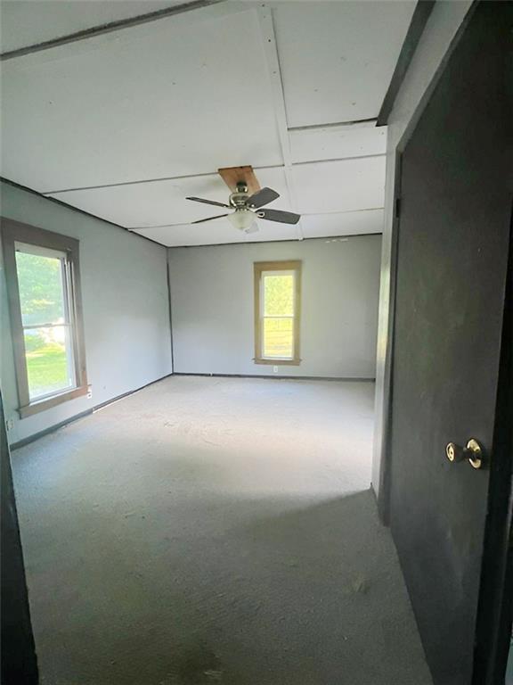 1247 Walnut Street Stoneboro, PA 16153 - Photo 17 of 18 a view of empty room with windows