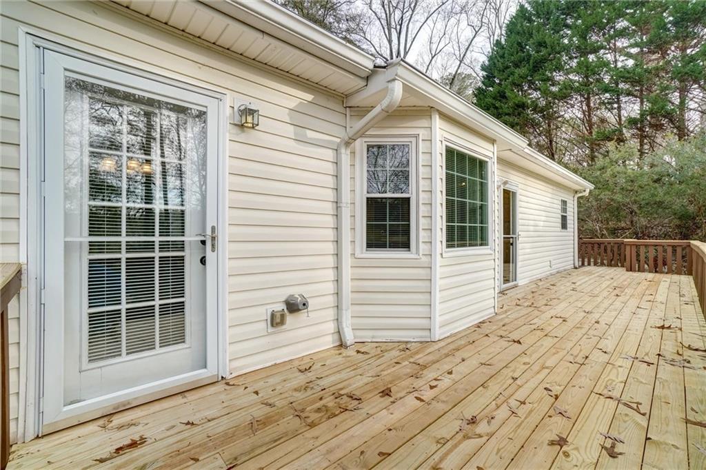 701 Longview Street Canton, GA 30114 - Photo 7 of 18 a view of a house with a backyard