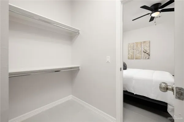 a room with a bed and a window