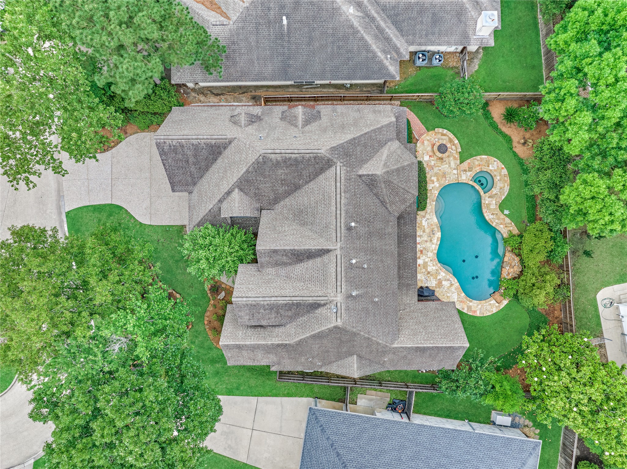 7 Gentry Oak Court Spring, TX 77381 - Photo 49 of 50 an aerial view of a house with a swimming pool