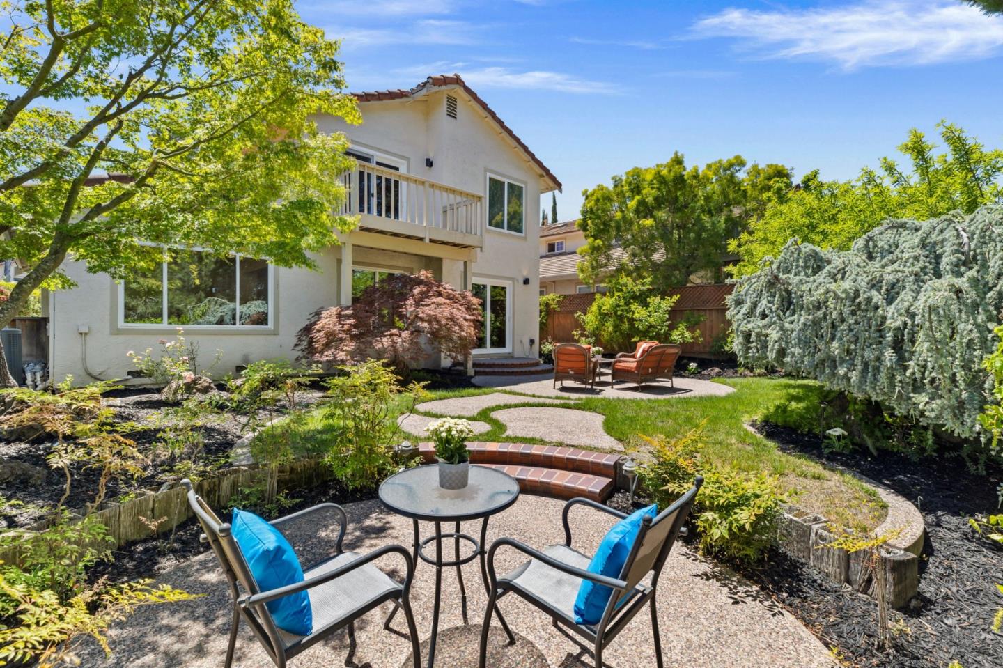 43643 Skye Road Fremont, CA 94539 - Photo 16 of 16 a view of backyard with table and chairs and potted plants