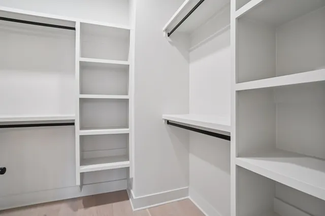 a view of an empty walk in closet