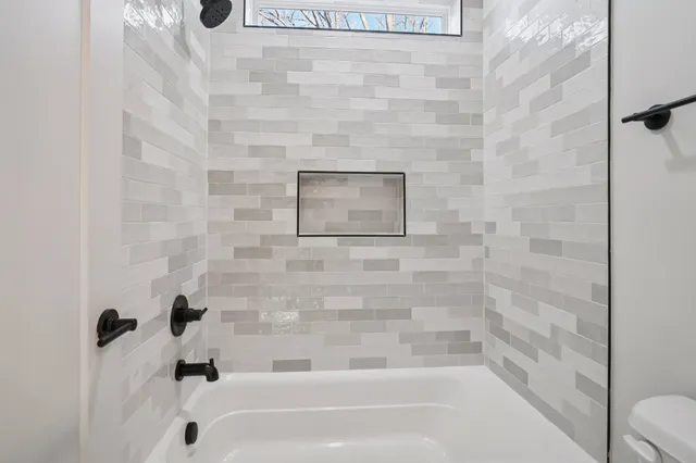 a bathroom with a bathtub