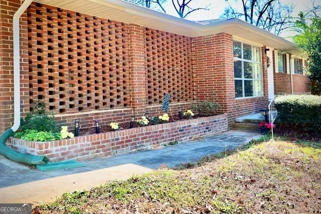 a view of a backyard with a garden
