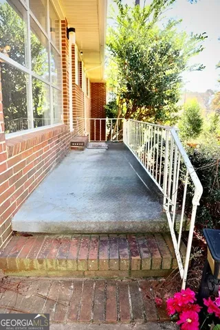 a view of outdoor space with deck and living room