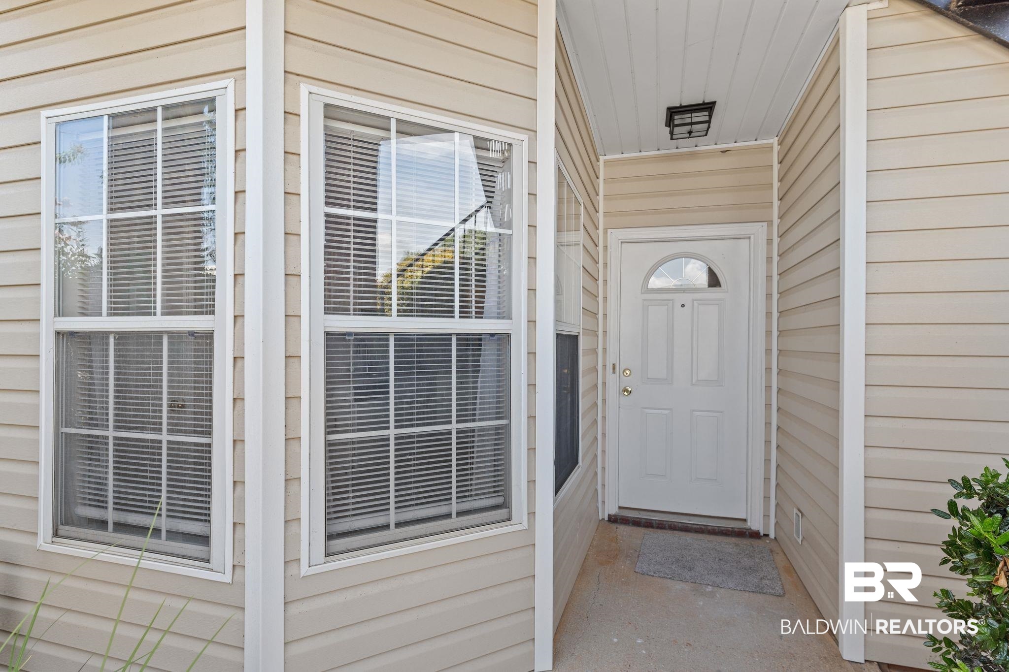 2651 South Juniper Street, Unit 203 Foley, AL 36535 - Photo 2 of 22 Property entrance featuring covered porch