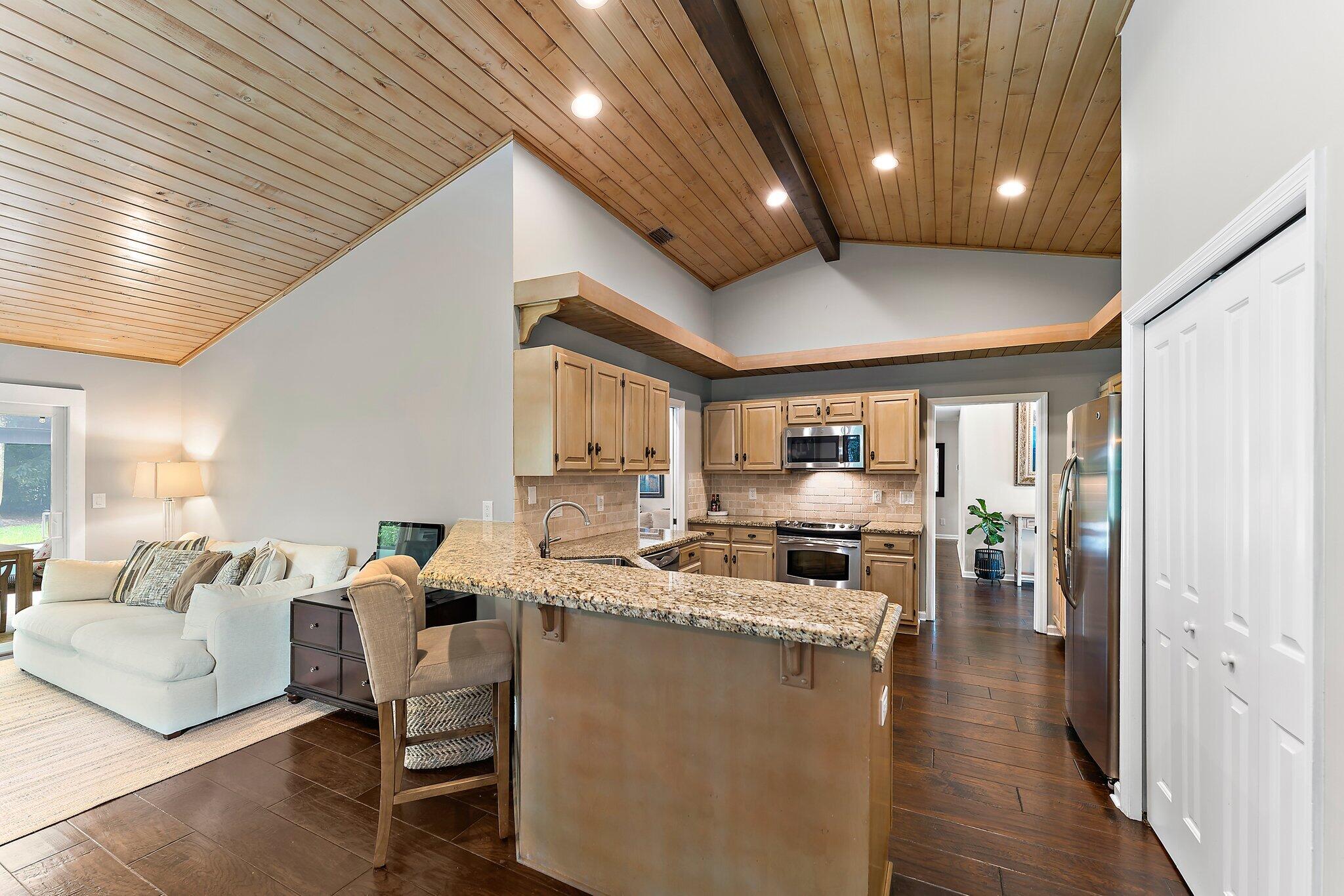 19546 Red Gum Trail Jupiter, FL 33458 - Photo 16 of 42 a living room with furniture and a large window
