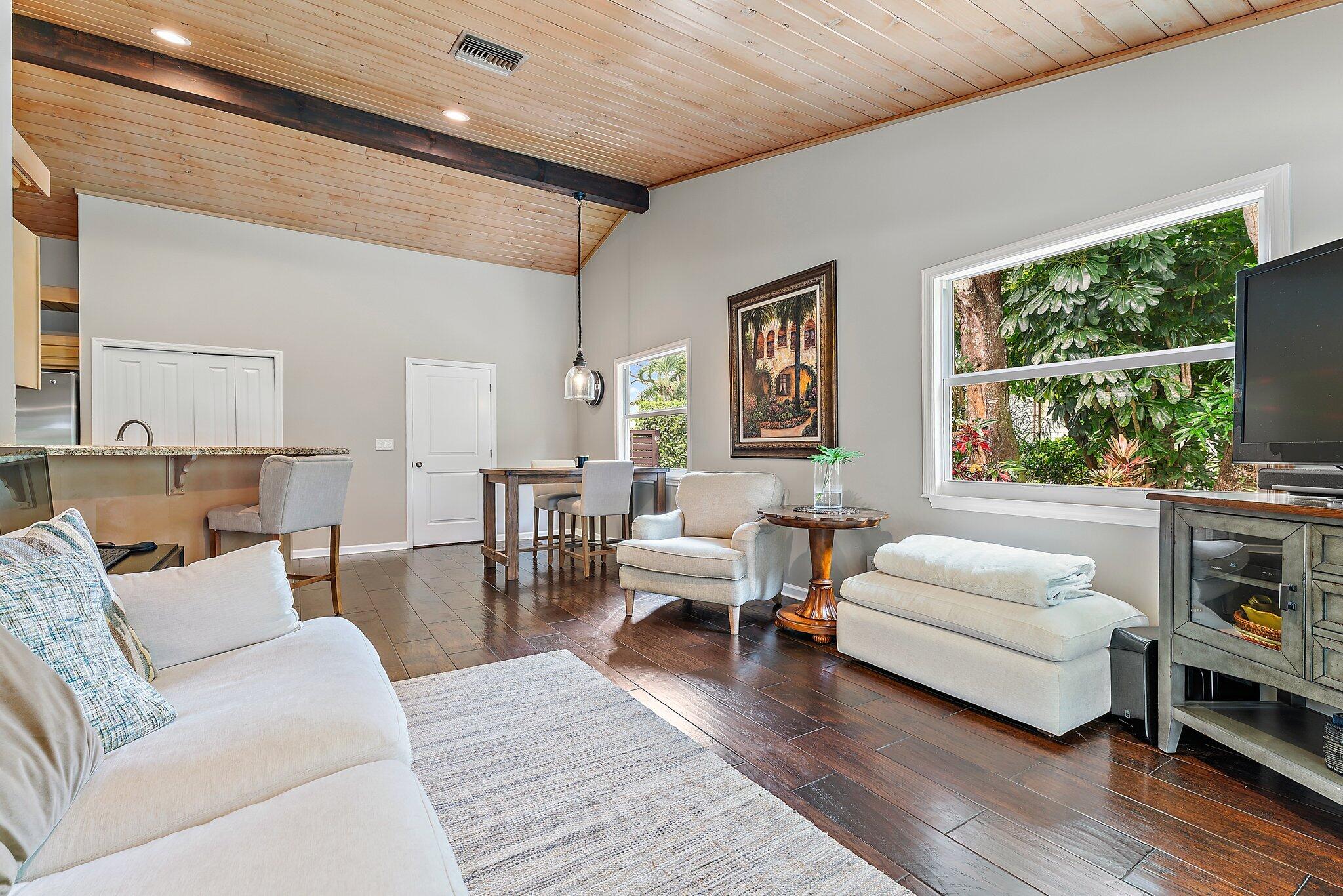 19546 Red Gum Trail Jupiter, FL 33458 - Photo 19 of 42 a living room with furniture and a large window