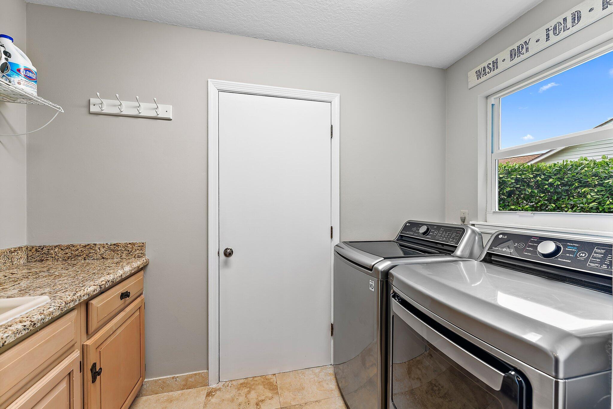 19546 Red Gum Trail Jupiter, FL 33458 - Photo 20 of 42 a utility room with washer and dryer