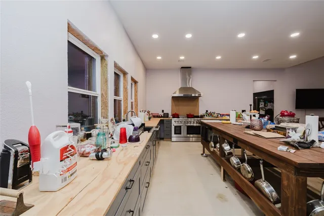 a very nice looking living room with dining room and flat screen tv