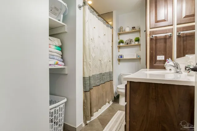 a view of a workspace with furniture