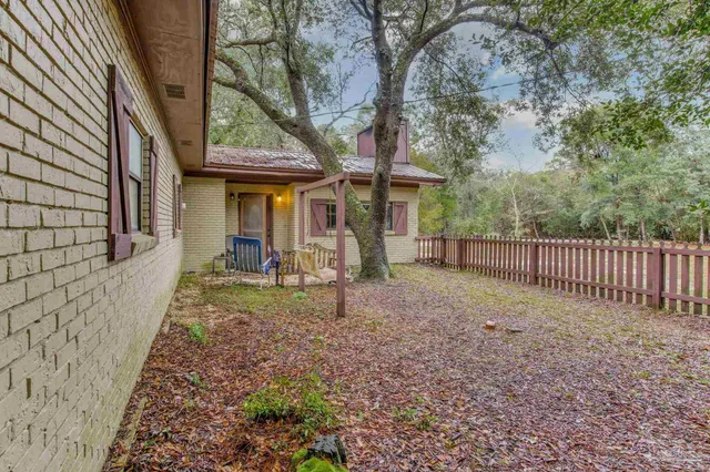 a kitchen with a stove and cabinets