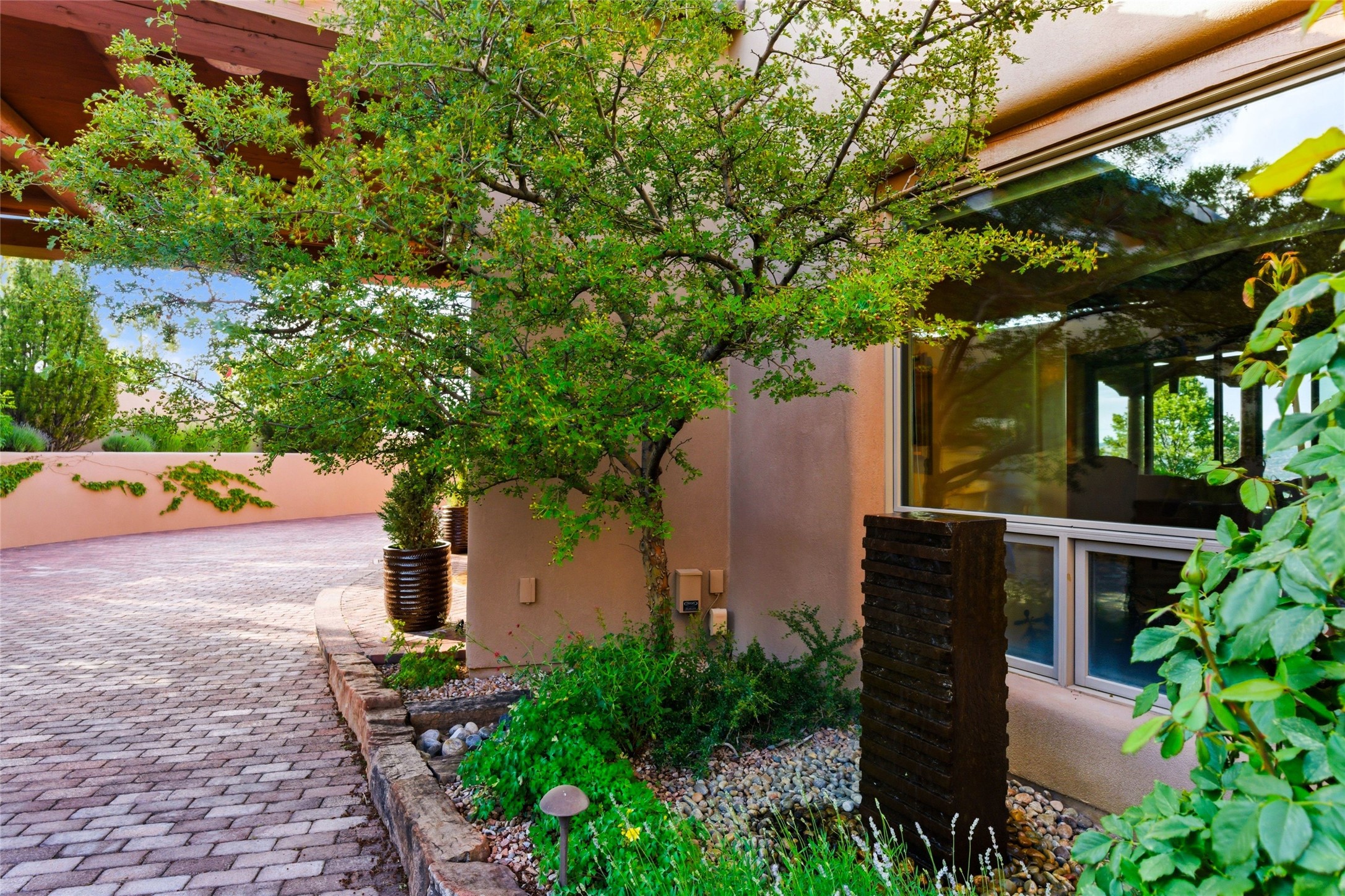 42 San Juan Ranch Road Santa Fe, NM 87506 - Photo 45 of 49 Beautifully Landscaped area near Front Entry.
