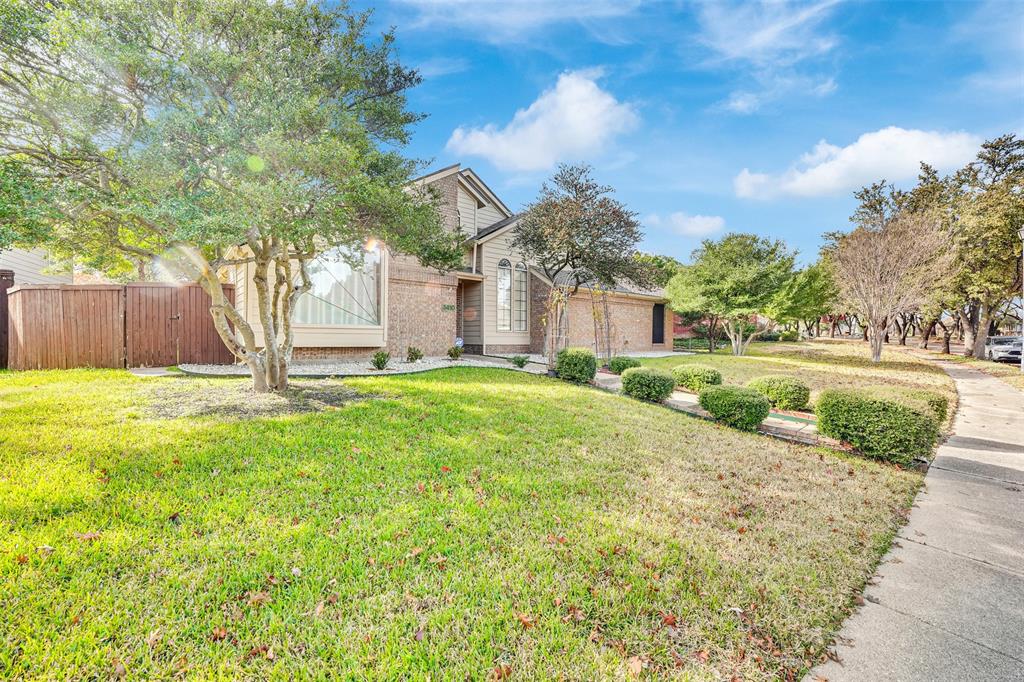 3410 Ridge Oak Drive Garland, TX 75044 - Photo 2 of 29 a front view of a house with garden
