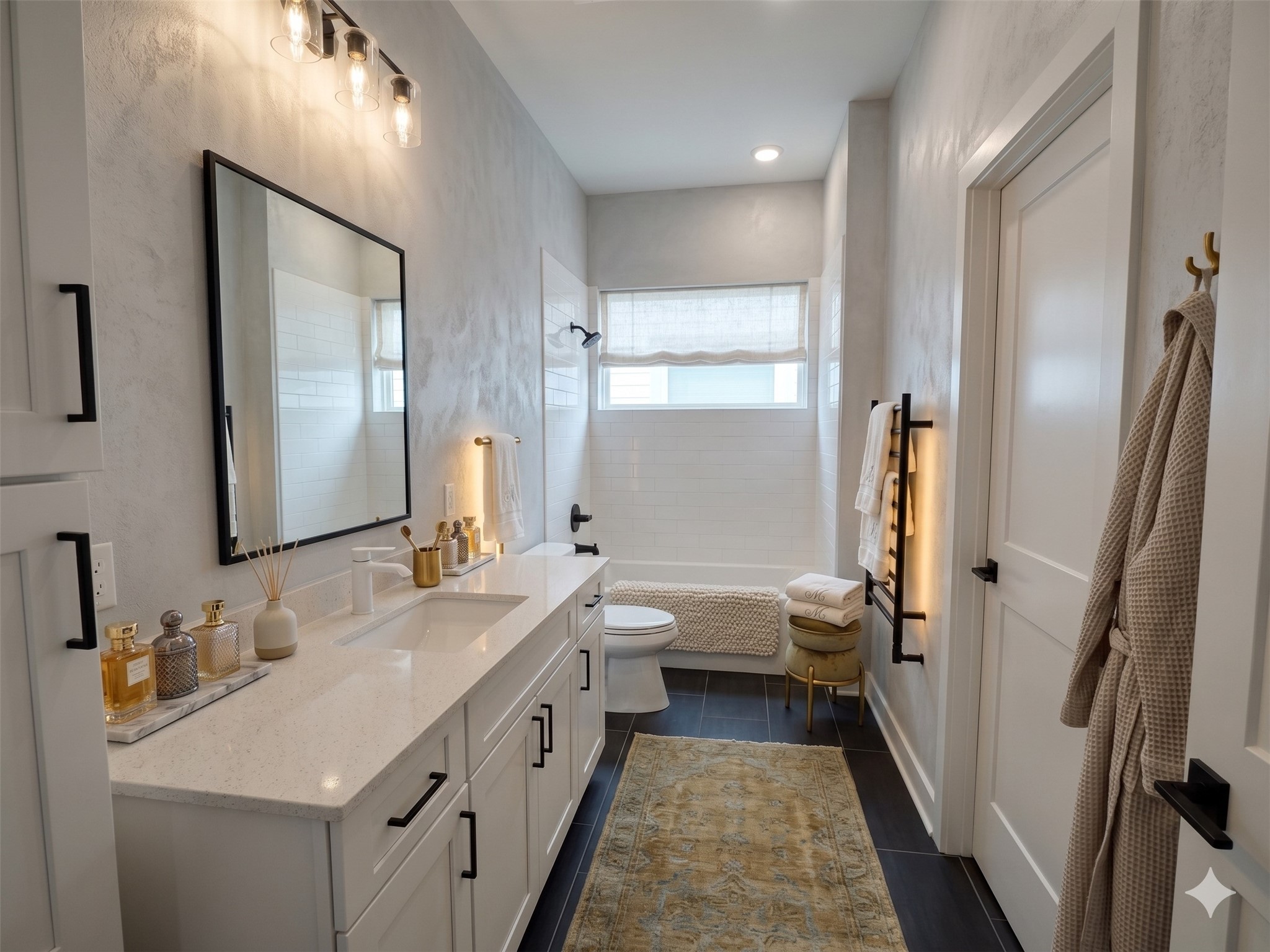 2000 Riverside Farms Road, Unit 19102 Austin, TX 78741 - Photo 9 of 13 This bathroom features a modern design with a sleek double vanity, large mirror, and stylish lighting. It includes a bathtub with a shower, white walls, and a bright window. The space is enhanced by dark floor tiles and warm accents for a cozy feel.