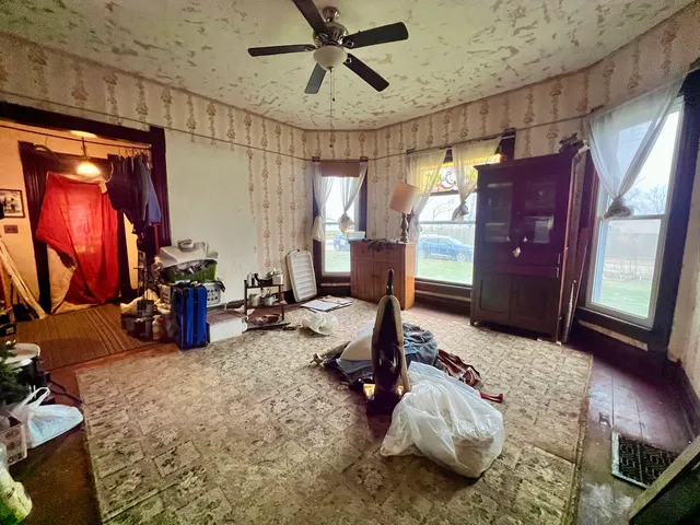a living room with furniture and a window