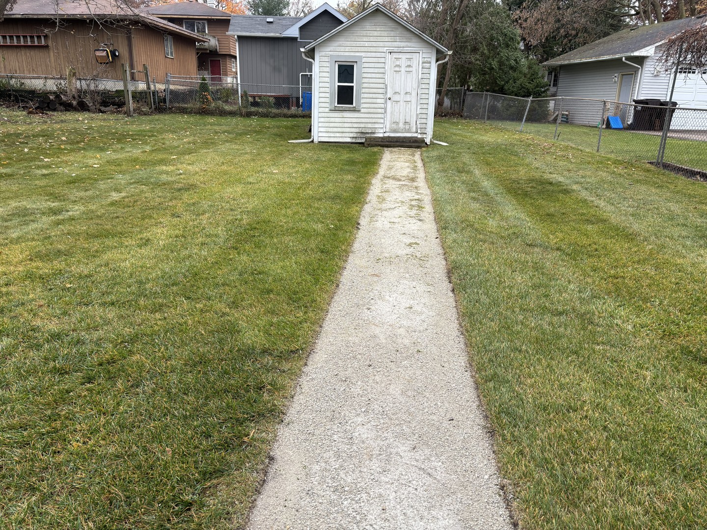 309 North River Road Fox River Grove, IL 60021 - Photo 4 of 13 a front view of a house with yard
