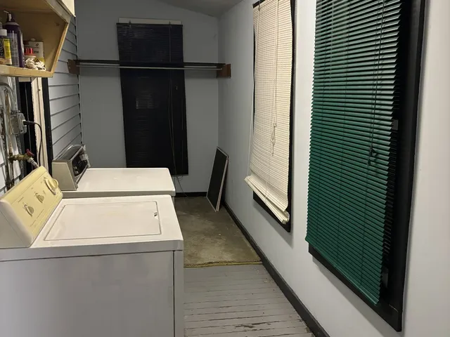 a view of a room with a hallway