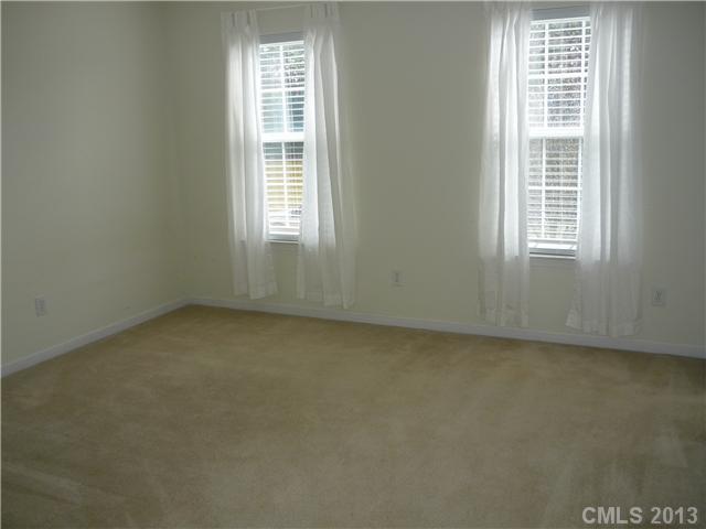 232 Royalton Road Mooresville, NC 28115 - Photo 12 of 16 an empty room with a window