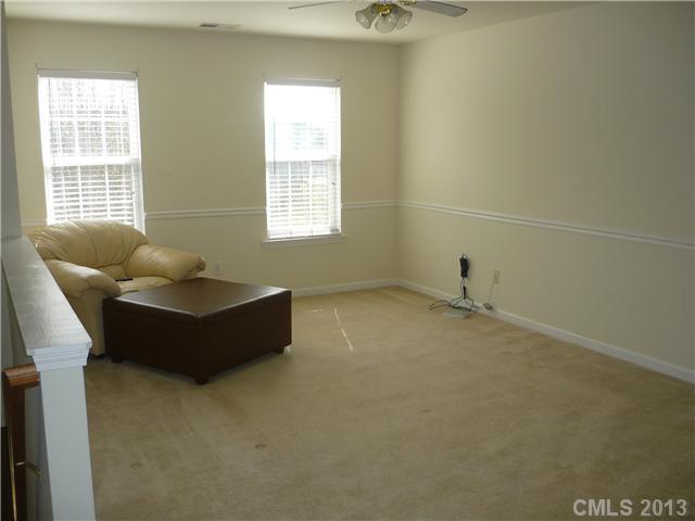 232 Royalton Road Mooresville, NC 28115 - Photo 10 of 16 a room with furniture and window