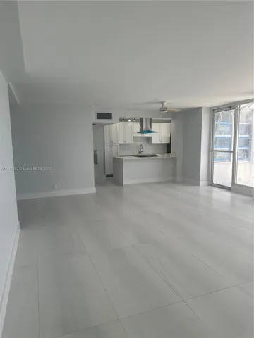 a room with a cabinets and a fireplace