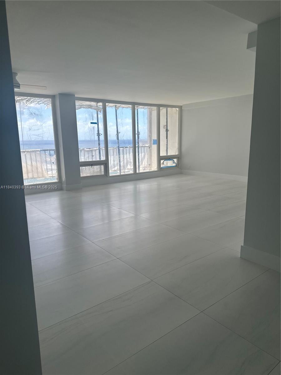 4280 Galt Ocean Drive, Unit 17C Fort Lauderdale, FL 33308 - Photo 6 of 16 a view of an empty room with a window