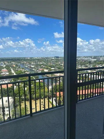 a view of a city from a balcony
