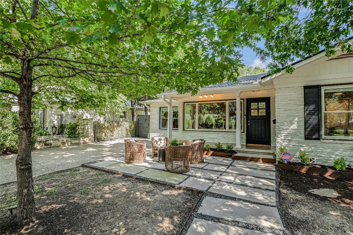 1802 West 34th Street Austin, TX 78703 - Photo 1 of 1 a view of a house with backyard sitting area and garden