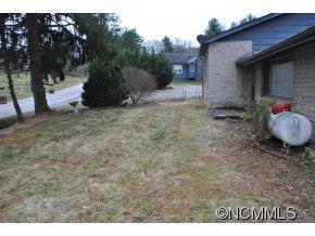 208 Green Valley Road Waynesville, NC 28786 - Photo 2 of 15 a view of a backyard