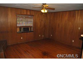 208 Green Valley Road Waynesville, NC 28786 - Photo 13 of 15 a view of an empty room with a window
