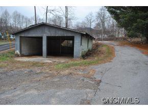 208 Green Valley Road Waynesville, NC 28786 - Photo 5 of 15 a view of a house with a yard