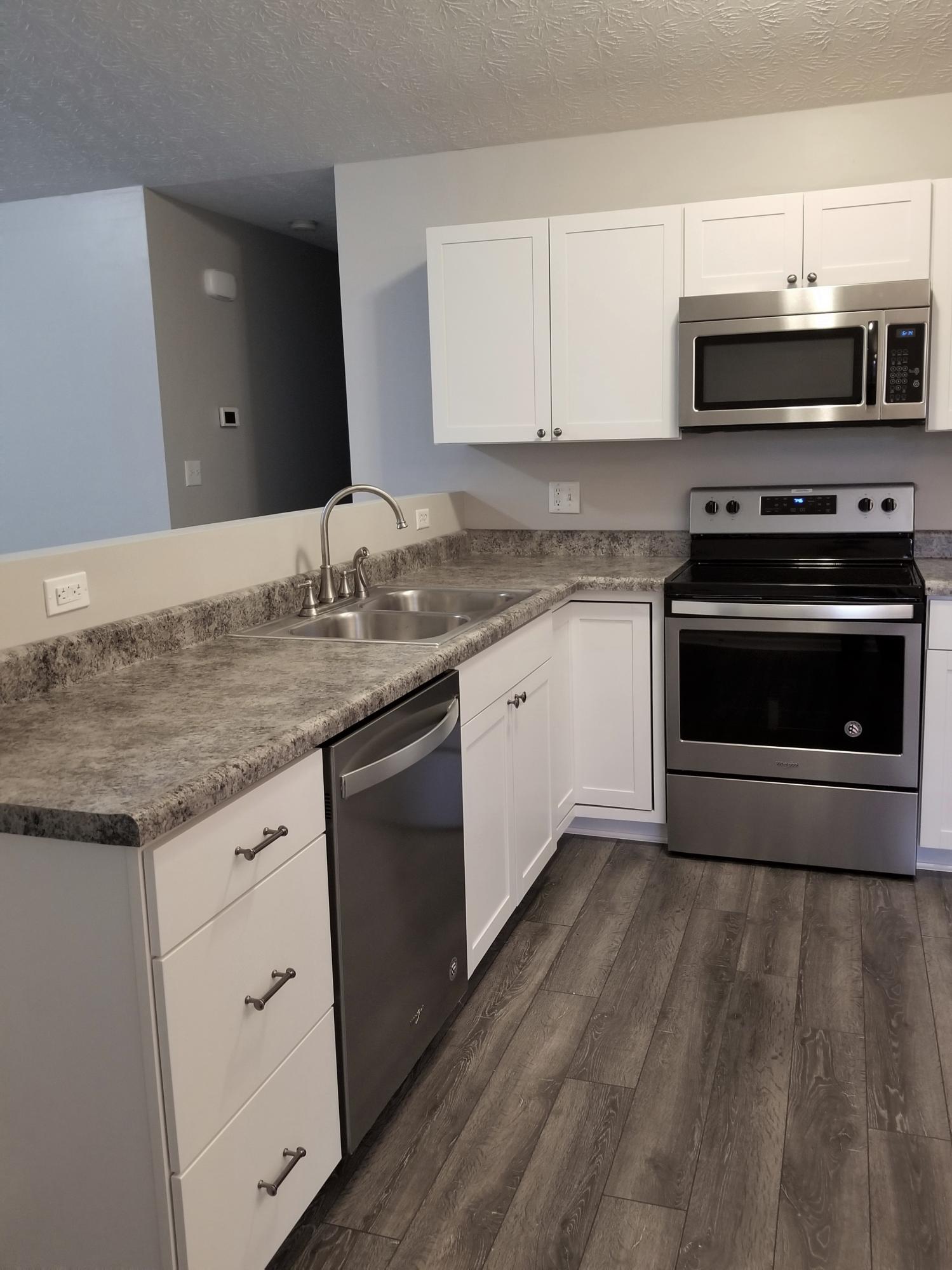 7621 Cotton Patch Road Corryton, TN 37721 - Photo 14 of 40 Kitchen Left side open to Greatroom