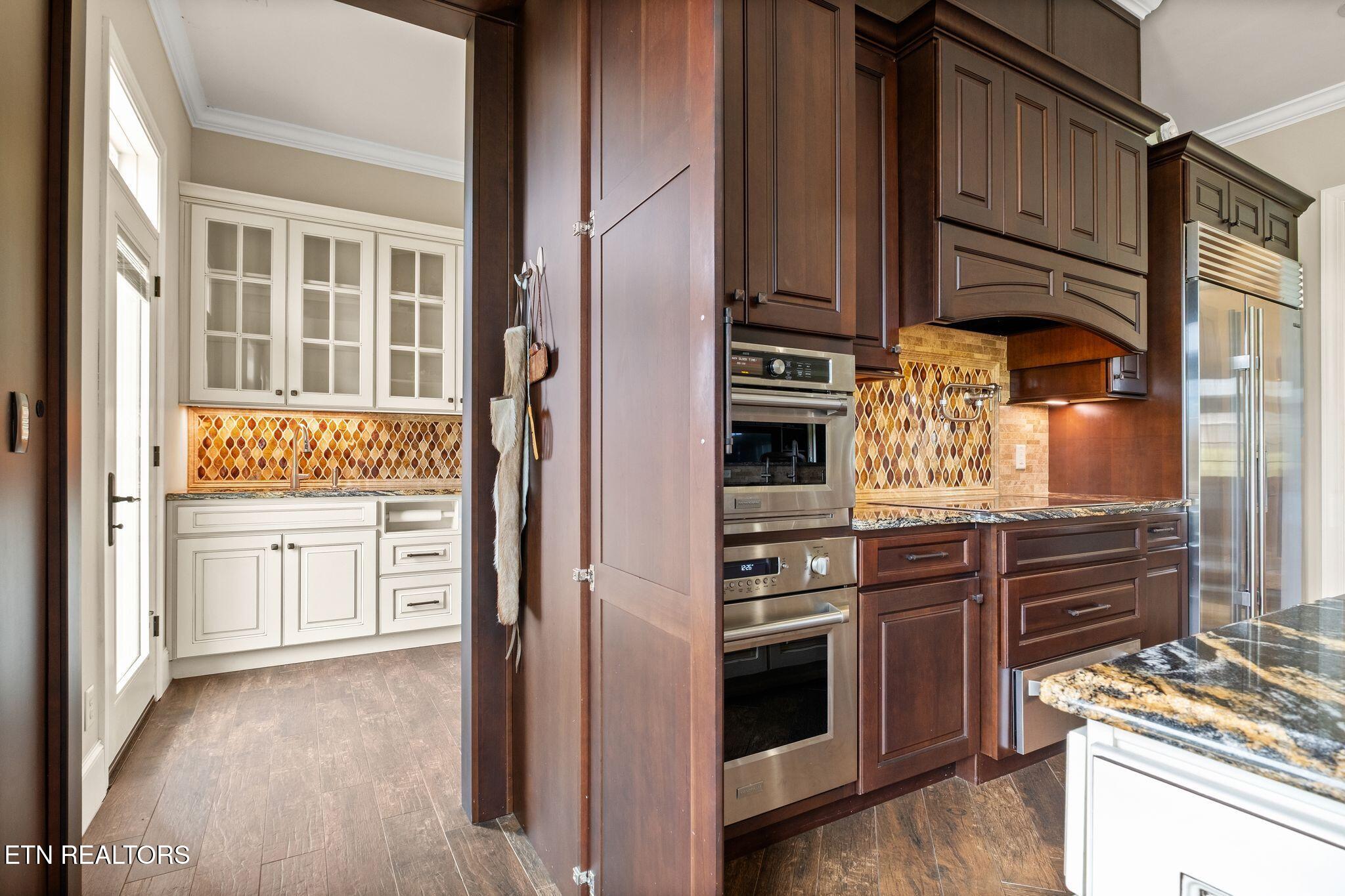 9676 Heard Ridge Road Monroe, TN 38573 - Photo 21 of 59 Pantry Entrace Through Kitchen Cabinet