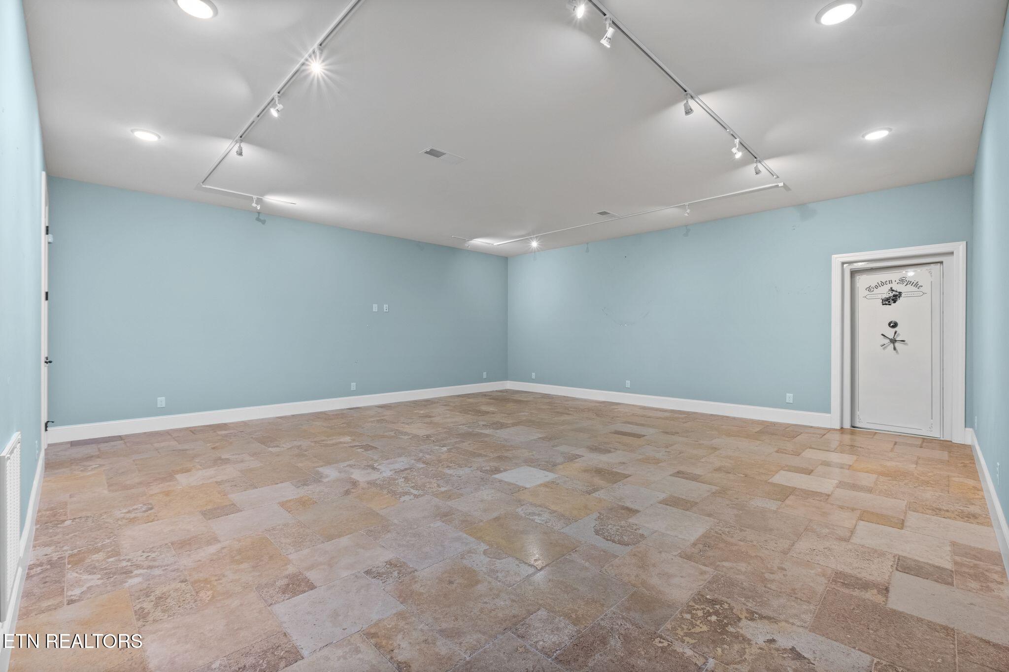 9676 Heard Ridge Road Monroe, TN 38573 - Photo 44 of 59 Lower Level Tropy Room and Safe Room