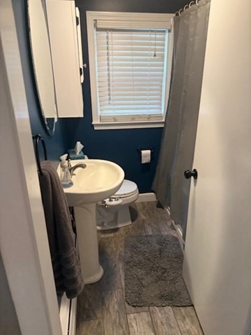 22 Forest Street, Unit 1 Ayer, MA 01432 - Photo 10 of 14 a bathroom with a sink and toilet