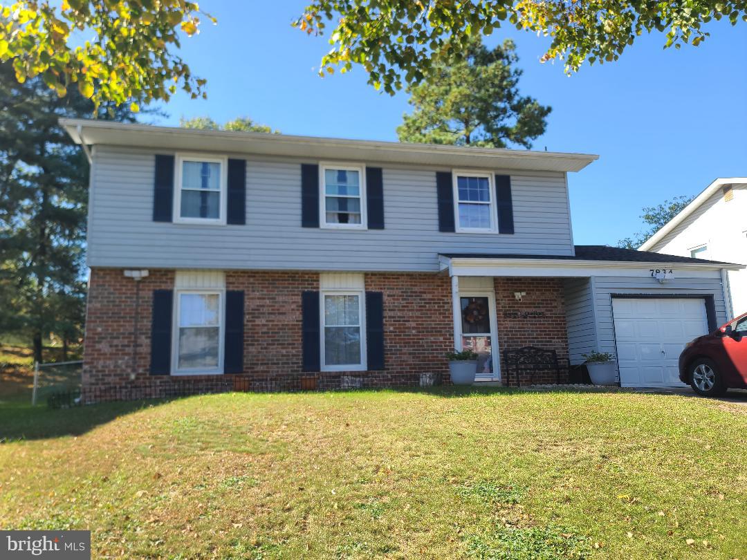 7834 Citadel Drive Severn, MD 21144 - Photo 3 of 58 a view of a house with a yard