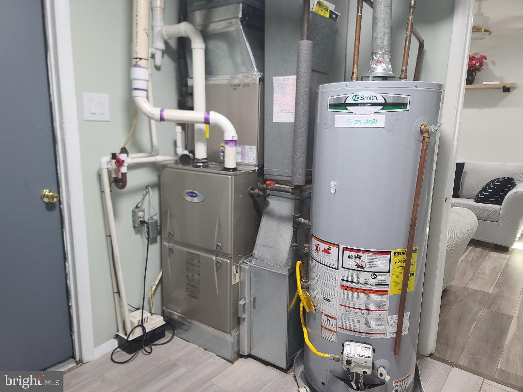 7834 Citadel Drive Severn, MD 21144 - Photo 36 of 58 a room with storage and utility