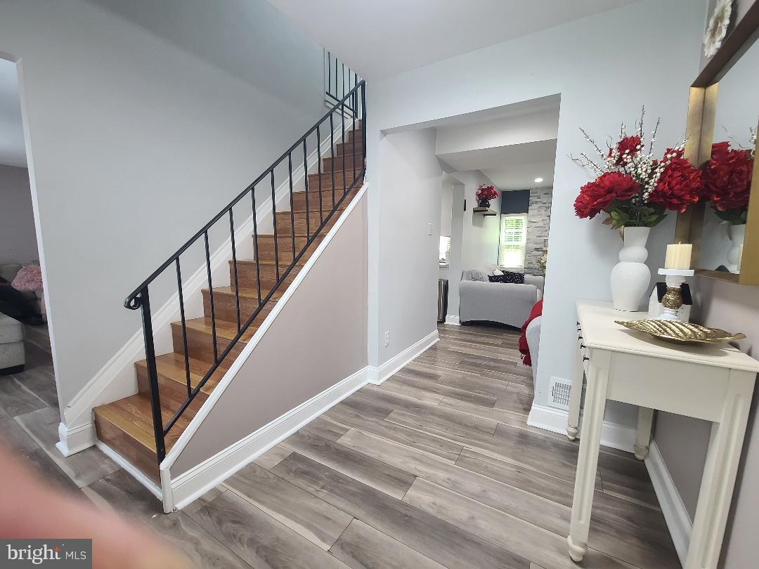 7834 Citadel Drive Severn, MD 21144 - Photo 8 of 58 a view of entryway and hall