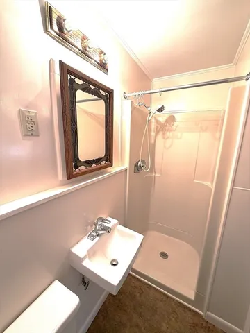 a white counter top oven sitting inside of a kitchen