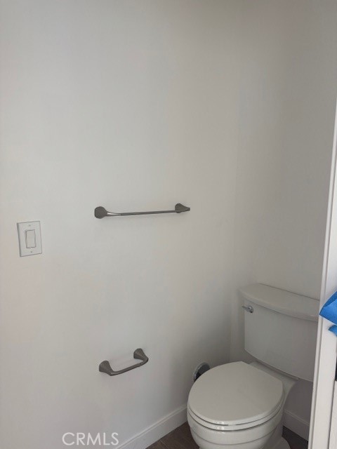 425 West Lime Avenue, Unit 1 Monrovia, CA 91016 - Photo 18 of 31 a white toilet sitting next to a white wall