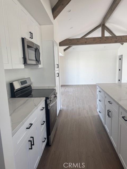425 West Lime Avenue, Unit 1 Monrovia, CA 91016 - Photo 5 of 31 a kitchen with cabinets wooden floor and a sink