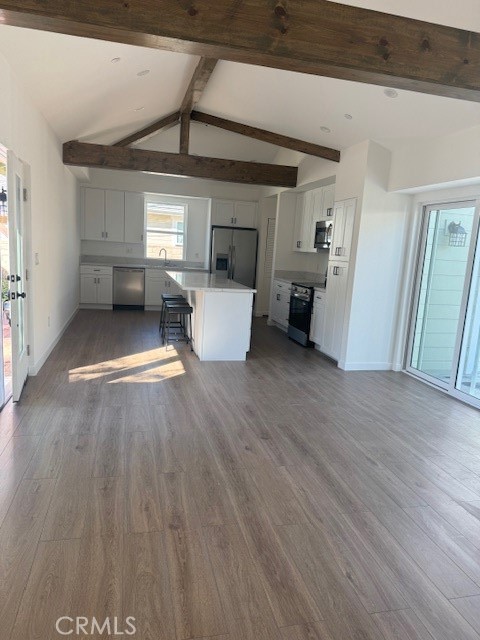 425 West Lime Avenue, Unit 1 Monrovia, CA 91016 - Photo 7 of 31 a view of a room with wooden floor and furniture