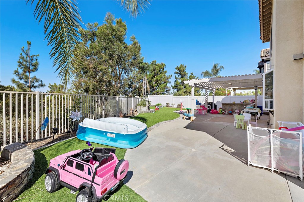 43 El Prisma Rancho Santa Margarita, CA 92688 - Photo 19 of 36 a patio with patio a couch and chairs