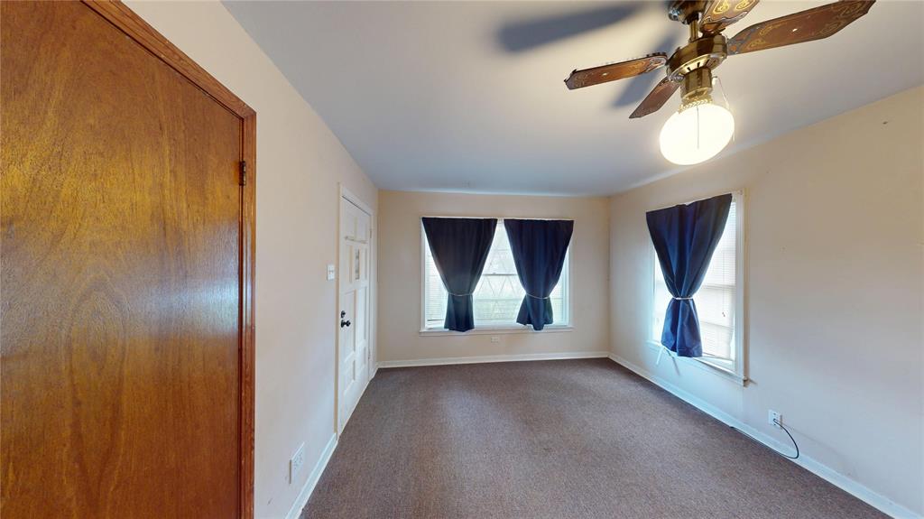 3125 McFerrin Avenue Waco, TX 76708 - Photo 25 of 36 Empty room with ceiling fan and carpet