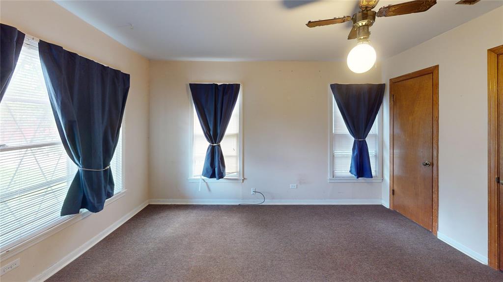 3125 McFerrin Avenue Waco, TX 76708 - Photo 34 of 36 Empty room featuring carpet and ceiling fan